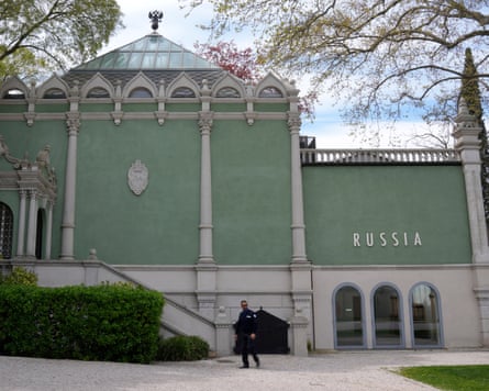 A private security officer walks past next to a closed Russia’s pavilion at the 59th Biennale of Arts exhibition in Venice in 2022