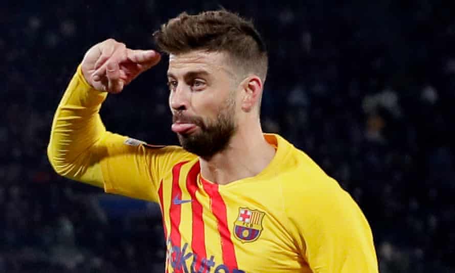 Benny Hill hello? Gerard Pique salutes the crowd.