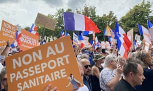 People gather to stage a protest against the vaccination requirement for some professions and the implementation of the Covid-19 health license as well as government’s policy with the battle against the pandemic at Chatelet Square in Paris, France.