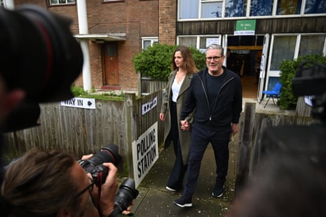 Keir Starmer and his wife Victoria leaving their polling station after voting in London.