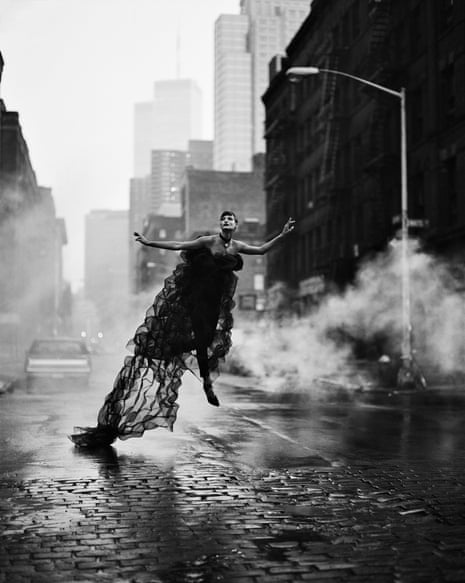 Linda Evangelista 'flying' through a New York street in a long, trailing black gown
