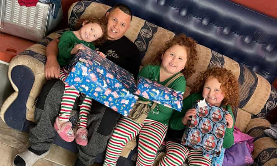 Juan Garcia with his three daughters.