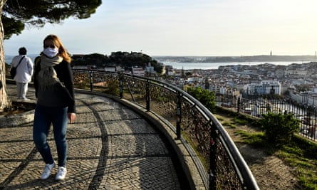People wearing masks in Lisbon