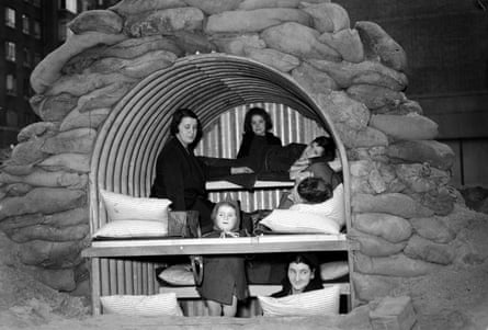 Londoners in a sandbag-protected Anderson shelter during the second world war.