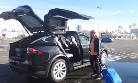 Stephanie Theobald gets ready to ‘board’ the Tesla Model X for the drive to Vegas.