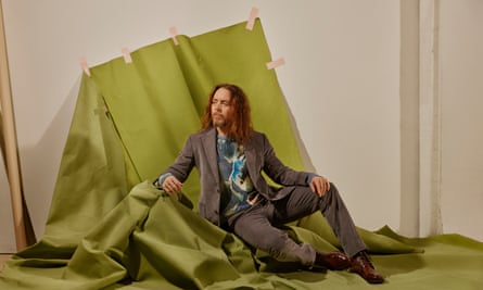 Tim Minchin, photographed in London this month. Set design: Lee Flude. Styling: Rosalind Donoghue. Grooming: Nohelia Reyes using Omorovicza and Aveda. Minchin wears blazer and trousers, richard-james.com; boots, russellandbromley.co.uk.
