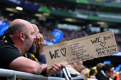 A fan holds a placard during the European Champions Cup final rugby union match between Leinster and La Rochelle at the Aviva Stadium in Dublin.