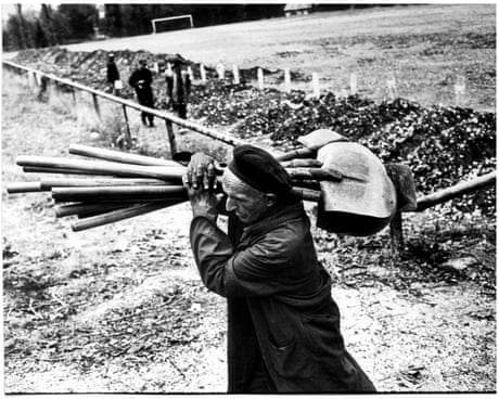 Football pitches turned into cemeteries in Sarajevo, 1992. This image was used on the cover of the first G2 section, 12 October 1992. Photograph: Sean Smith/The Guardian