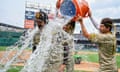 Dylan Cease, left, is doused by teammates Manny Machado, center, and Tyler Wade, right, after he pitched a no-hitter against the Washington Nationals. 