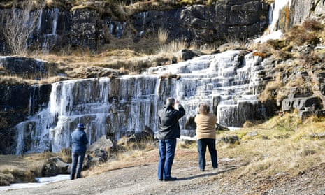 A frozen waterfall near Pen y Fan mountain on Brecon Beacon national park in Wales.