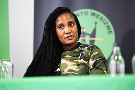 Duduzile Zuma-Sambudla wearing a military-style top at a media event for her political party.