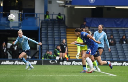 Sam Kerr scores with a header.