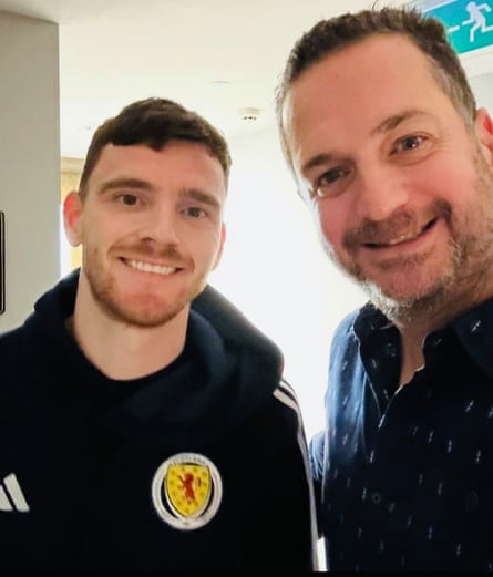 Mark Stevenson alongside Andy Robertson in Glasgow in November 2024