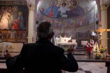Father Gabriel Romanelli celebrates mass at a church in Gaza City