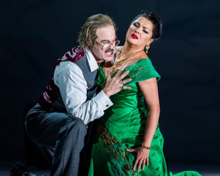 Gerald Finley (Baron Scarpia) and Anna Netrebko (Floria Tosca) perform in Tosca at the Royal Opera House in London.