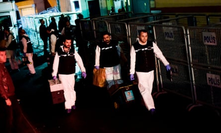Turkish forensics police officers leave after searching the Saudi consulate in Istanbul on 18 October 2018