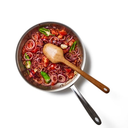 Baingan bharta. Add the aubergines to the pan. Mash with a wooden spoon or similar until fairly smooth, then leave to simmer until most of the liquid has evaporated.