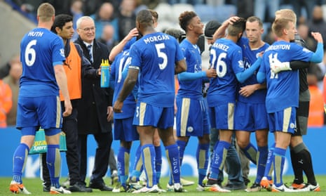 Leicester’s manager Claudio Ranieri celebrates with players at the end of the Premier League game with Swansea City on 24 April.