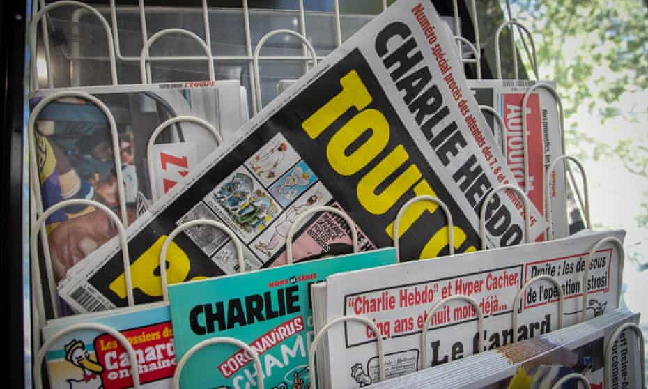 Charlie Hebdo magazine for sale in a newsagent