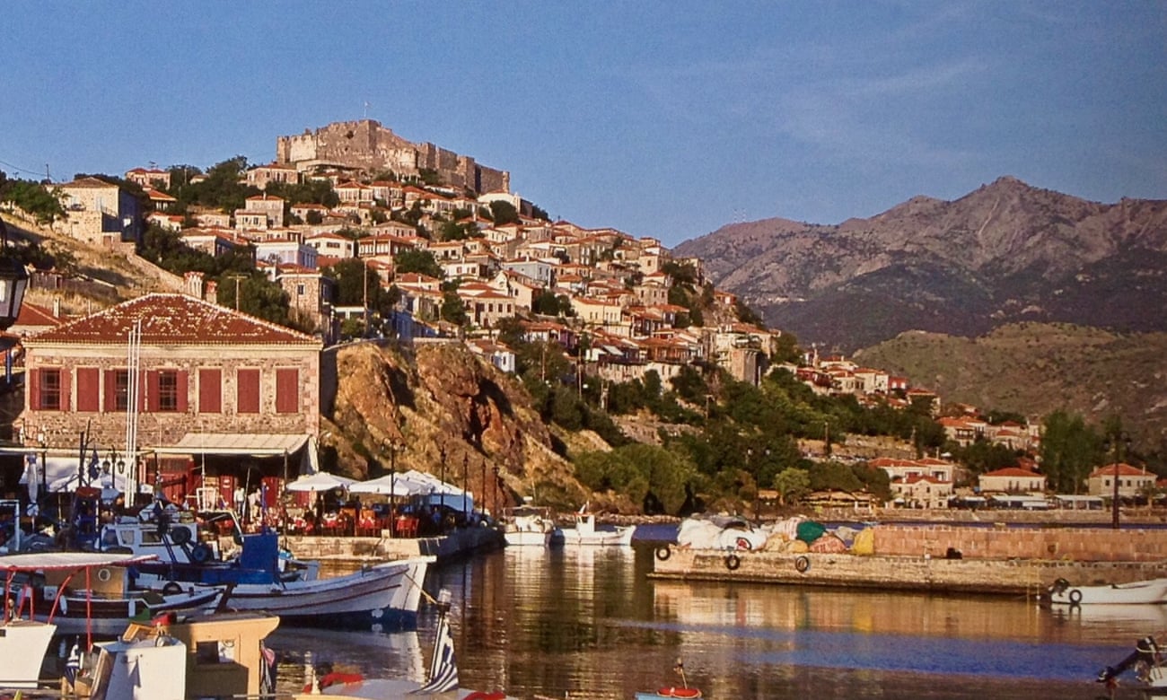 A view from the Molyvos harbour with the old castle at the top.