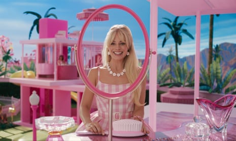 Margot Robbie, as Barbie, in a world of pink.