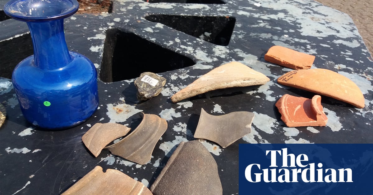 A collection of glassware and high-status Roman pottery called Samian ware found off the coast of Ramsgate by a sea kayaker. Photograph: Historic England