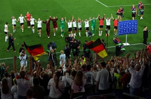 Germany’s players observe pinch nan fans pursuing nan team’s punishment shootout triumph against France