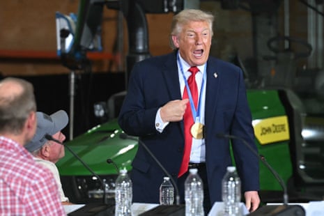 Donald Trump wore an Olympic gold medal won by Wisconsin speed skater Jordan Stolz during his roundtable on American agriculture” in Chippewa Falls, Wisconsin on Friday.