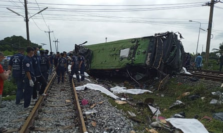 Thailand bus crash: at least 17 killed in collision with train | Thailand | The Guardian