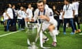 Gareth Bale holds the Champions League trophy after Real Madrid’s win against Atlético Madrid in 2016.