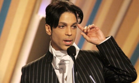 Recording artist Prince accepts his award for best male R&amp;B artist at 2006 BET Awards at Shrine Auditorium in Los Angeles