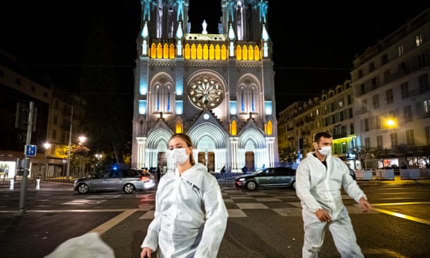 Forensic officers at Notre Dame basilica in Nice on Thursday night.
