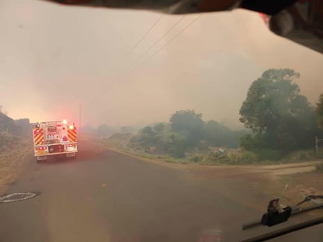 A firetruck seen during smoky conditions