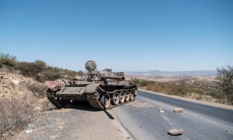 A damaged tank stands on a road north of Mekele, the capital of Tigray, in February 2021. 