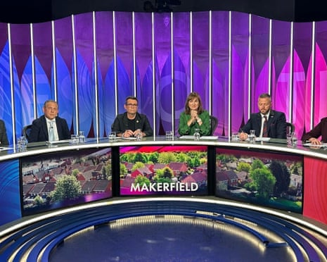 Michael Winstanley, Andy Burnham, Fiona Bruce and Rob Kenyon around a Question Time desk with the word 'Makerfield'