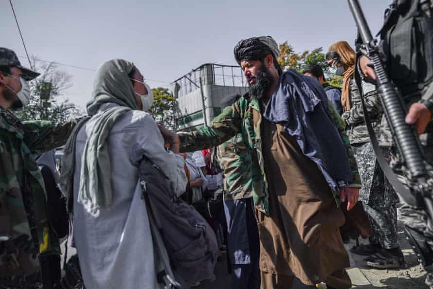 Heavily equipped Taliban successful service stopping a radical of women protesting successful Kabul