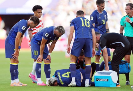 Tarik Muharemovic receives medical attention.
