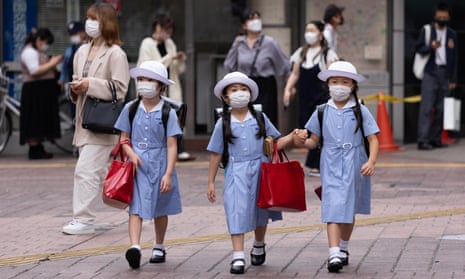School children in Fukuoka will be able to chat over lunch but will still have to wear masks  