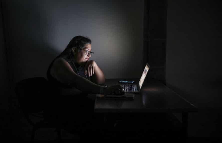 Maria Salguero works at her computer in Mexico City