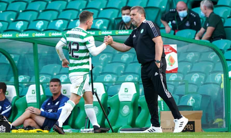 Celtic’s manager, Ange Postecoglou, shakes hands with Callum McGregor during the pre-season friendly with Preston at Celtic Park.