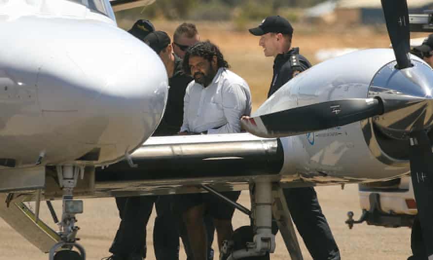 Terence Darrell Kelly boards a level   aft  being taken into custody successful  Carnarvon.
