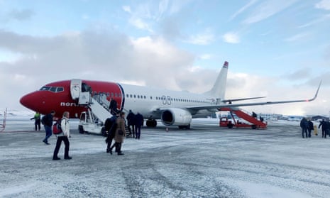 Passengers board a Norwegian Air plane in Norway last winter