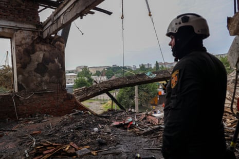 Debris removal works continue after Russian drone attack in Kharkiv.