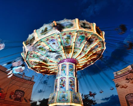 View of a Moving Chain Swing Ride at Dusk, Prater Amusement Park, Vienna