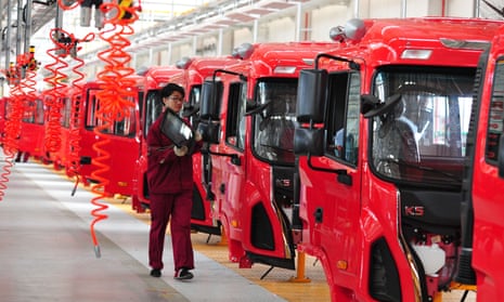 A production line of red vans in China