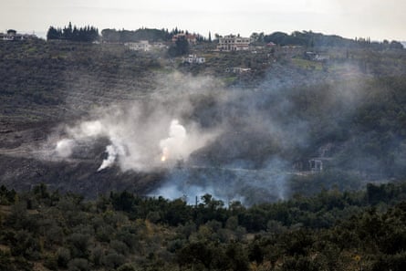 Smoke rises from the site of a Syrian army weapons depot hit overnight by an Israeli bombardment.