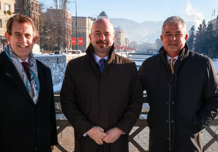 A smiling Binnall, Ginkel and Flynn stand outside on a sunny winter’s day