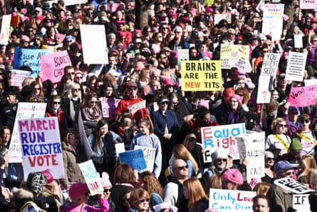people holding signs