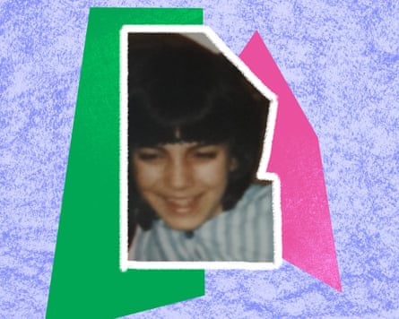 Close up of a young girl wearing a blue and white striped shirt with short dark hair
