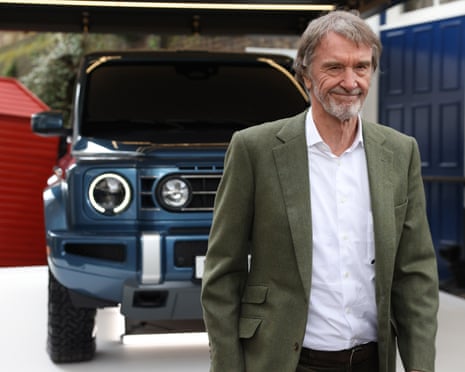 Jim Ratcliffe next to a car